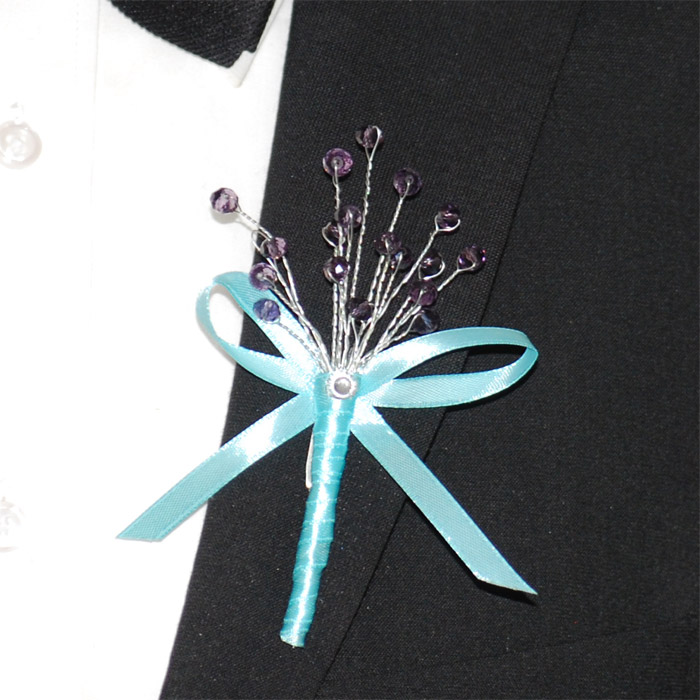 Corsage Rosett Kristall Turkos