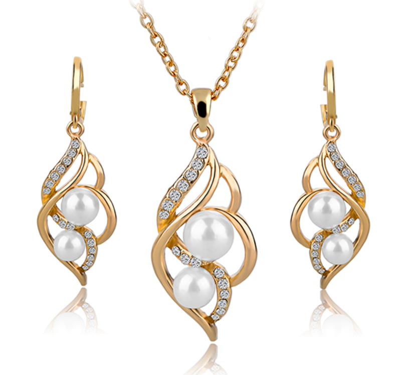 Smyckeset med Austrian Crystals och Simulated Pearls - 18K Roséguldplätering och vita Pärlor