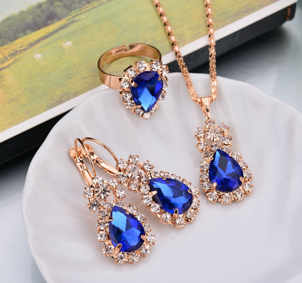 Smyckeset med Austrian Crystals och i 18K Guldplätering -Blå Kristaller