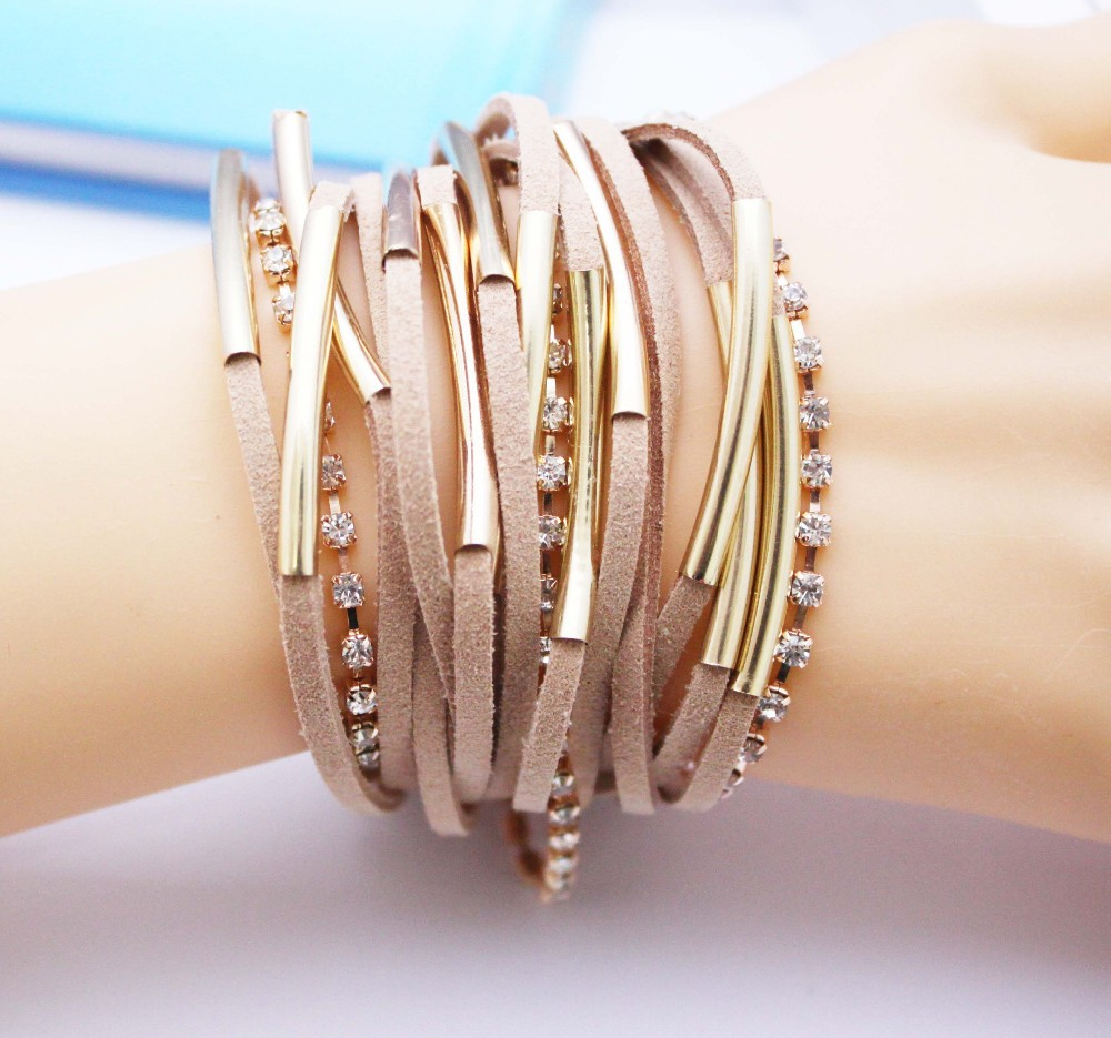 Armband i läder och Strasskristaller samt i 18 K Guldplätering