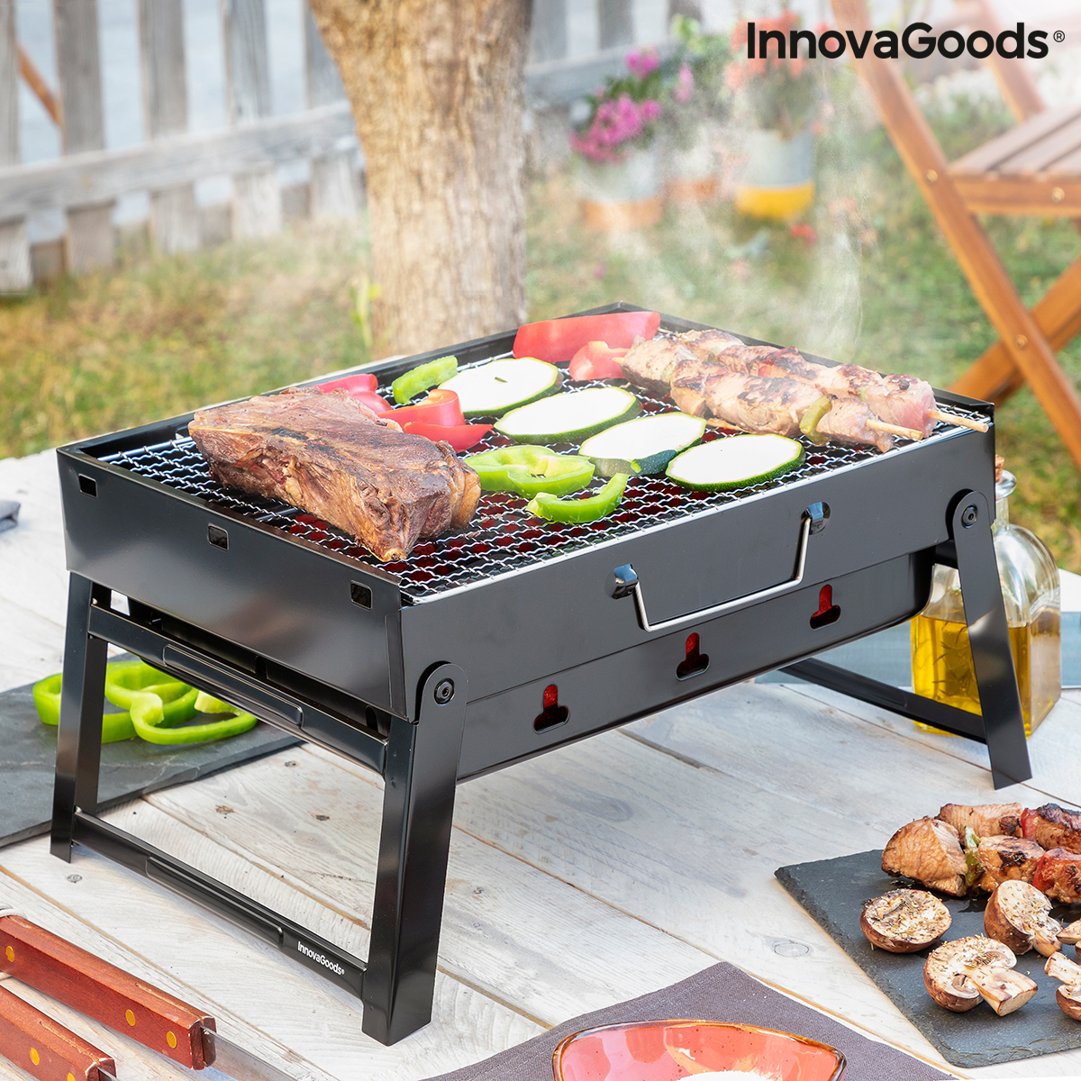 Hopfällbar bärbar kolgrill för användning med träkol BearBQ InnovaGoods
