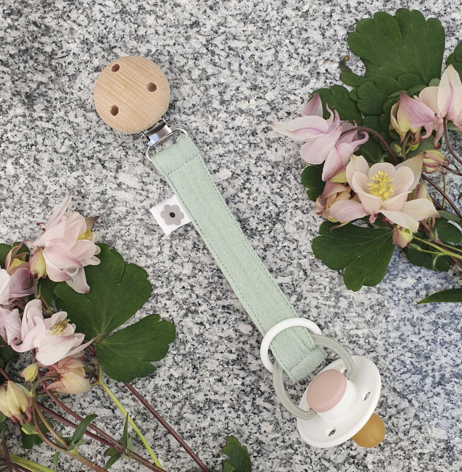 Napphållare muslin cameo green eko