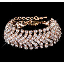 Armband med ett band av Austrian Crystals och i 18 K Guldplätering