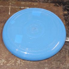 Blå glittrig frisbee