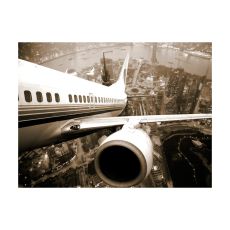 Fototapet - Flygplan lyfter från staden