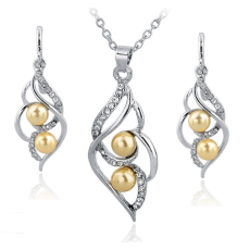 Smyckeset med Austrian Crystals och Simulated Pearls - 925 Sterling Silverplätering och gula Pärlor