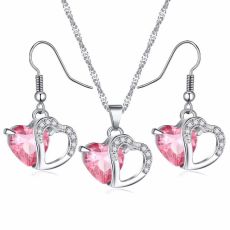 Smyckeset  "Twin Hearts" med Cubic Zirconia och i 925 Sterling Silverplätering -Rosa